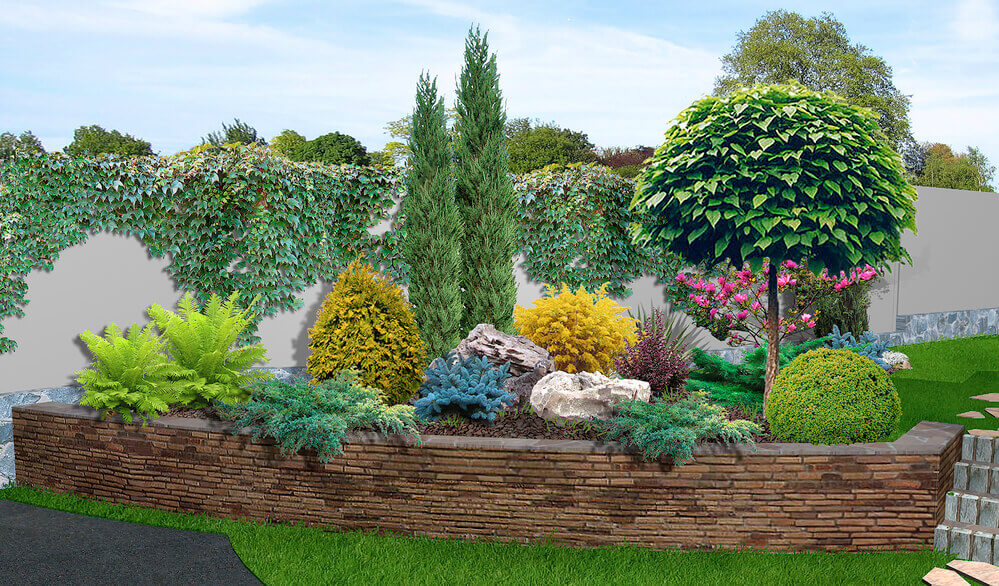 a thin stone retaining wall with a garden bed inside it